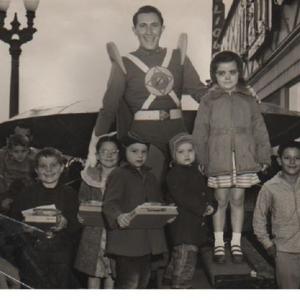 Commander Comet Show. 1954. Dian is little girl with hands together, hat, patch on pants, and next to top step.