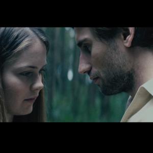 Still of Hera Hilmar and Edward Holcroft in Bitter music video for Palace directed by Liam SaintPierre
