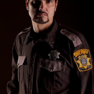 Larry Wade Carrell as Sheriff McElroy