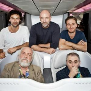 Aidan Turner Graham McTavish and Dean OGorman on board Air New Zealand special The Hobbit air plane during flight to world premiere of The Hobbit An Unexpected Journey