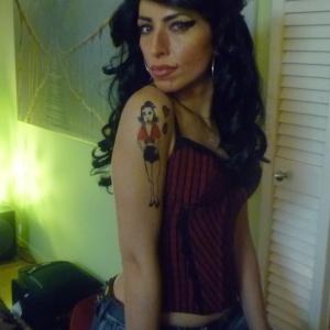 Sandra De Sousa as Amy Winehouse