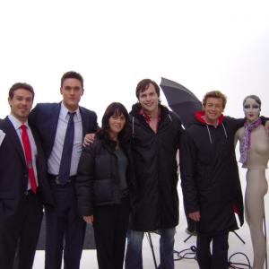 Tamas Menyhart along with Simon Baker Robin Tunney and Owain Yeomanworking on the TV Show The Mentalist  The Red Box 