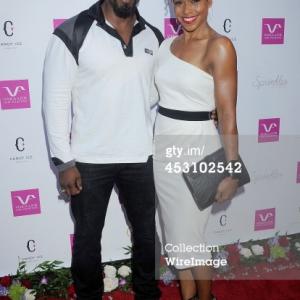 Gillian Waters and fiancee Michael Jai White at Vivica Fox's 50th birthday celebration in Beverly Hills.