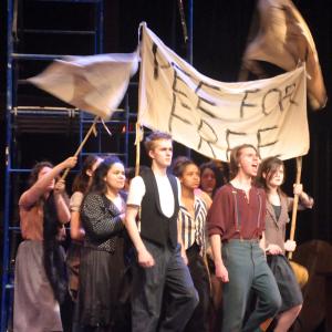 Kent Jenkins as Bobby Strong in Urinetown at Sidwell Friends School 2014