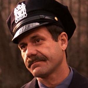 Zack Norman as Patrolman Levy in 