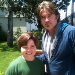 Zach with Billy Ray Cyrus on the set of Hannah Montana.