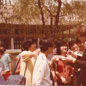 Signing autographs for a few Korean Kids. 1985.
