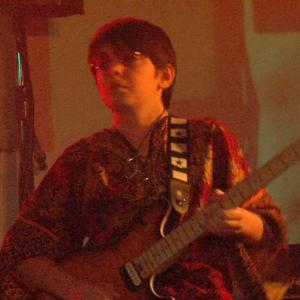 Evan Materne on lead guitar at The Beatles tribute show