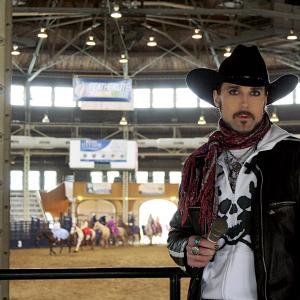 MATT WIGGINS prepares to make comments during an appearance at the annual Horse Fair in Des Moines IA in April 2014