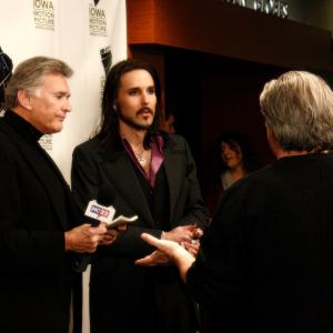 Matt Wiggins is briefed before an interview at the Iowa Motion Picture Associations Golden Globes Event in 2014