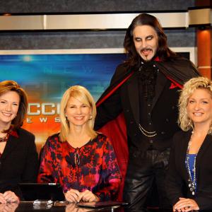 Matt Wiggins with KCCI CH 8 Des Moines News Anchors after appearing in as Dracula in a Live television interview