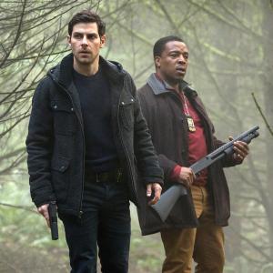 Still of Russell Hornsby and David Giuntoli in Grimm 2011