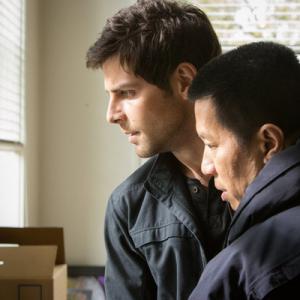 Still of Reggie Lee and David Giuntoli in Grimm 2011