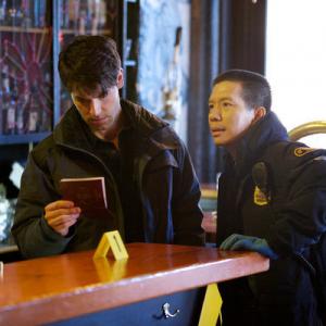 Still of Reggie Lee and David Giuntoli in Grimm 2011