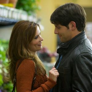 Still of Bitsie Tulloch and David Giuntoli in Grimm 2011