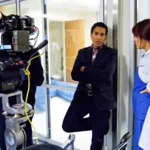 Dr. Sanjay Gupta and Emily Swallow on the set of Monday Mornings