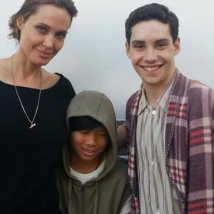 John D'Leo with director Angelina Jolie on the set of 
