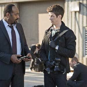 Still of Jesse L Martin and Grant Gustin in The Flash 2014