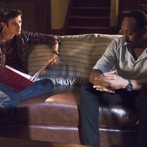 Still of Jesse L. Martin and Grant Gustin in The Flash (2014)