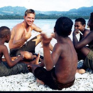 Private Hoke played by Will Wallace with Guadalcanal children in The Thin Red Line