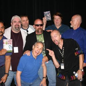 Tom Savini (far left), Peter John Ross, Dan Hall, Papaw (sunglasses), Jim Wynorski (holding DVD), John Huff, Lloyd Kaufman (front) and Jim O'Rear at the 2007 B Movie Celebration