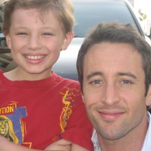 Max with Alex OLoughlin on the set of Three Rivers