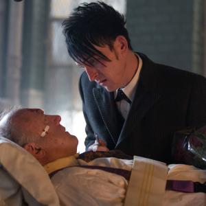 Still of John Doman and Robin Lord Taylor in Gotham 2014