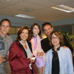 Emily Rae on set filming Private Practice with Kate Walsh Paul Adelstein Taye Diggs and director Donna Deitch