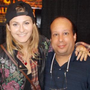 Michael J Tomaso and Scout TaylorCompton who played Laurie Strode in Rob Zombies versions of Halloween and Halloween II pose for a photo at Spooky Empire in Orlando FL in October 2014