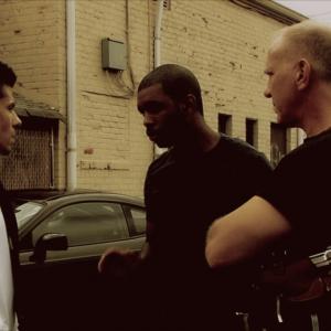 Miller (Chris Corulla Jr.), Stokes (Andre' Joseph), and Talbot (Drew Henriksen) prepping up for a bust.