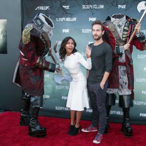Actress Nicole Beharie L and actor Tom Mison attend Los Angeles special screening and QA of FOXs Sleepy Hollow at Hollywood Forever on June 2 2014 in Hollywood California