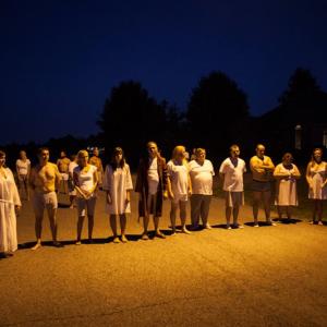 Production still from the film Lucid Patrick is in the center with robe as a Sleepwalker