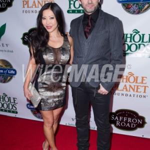 Toni Lee and Michael Sheen attend the Whole Planet Foundation's Pre-GRAMMY event at Village Recorder Studios on January 23, 2014 in LA, CA