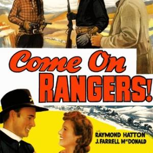 Roy Rogers Lynne Roberts and Harry Woods in Come On Rangers 1938