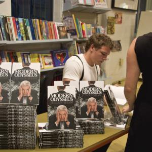 Julian Shaw signs copies of Modern Odysseus at the Ariel Booksellers launch in Sydney.