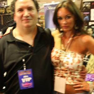 James Magnum Cook with ActressModel Stacey Dixon at Fright NightFandom Night 2011 in Louisville KY Sorry about the reflection as the camera hit the lights wrong