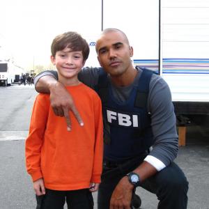 Griffin on the set of Criminal Minds with Shemar Moore.