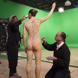 On set for Paris 3D film shoot of Summer Space, for Merce Cunningham pilot, adding dots to costumes I made for the dancers, with digitally printed fabric based on original Rauschenberg sets and costumes