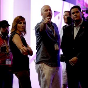 Jeremy Snead with host Alison Haislip taking Nintendo CEO Reggie FilsAimee through shots at E3 2015