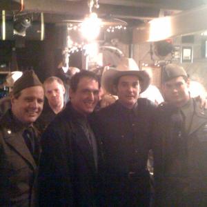 On set of THE LAST RIDE from left to right John Cann Mark DeAlessandro Henry Thomas and Will Koberg