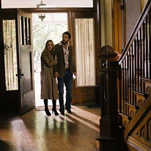MELISSA GEORGE and RYAN REYNOLDS star as real-life couple Kathy and George Lutz in THE AMITYVILLE HORROR.