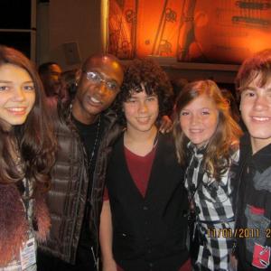 Bryce Hitchcock and friends with Tommy Davidson backstage at Artists for Peace Organizations Never Again Concert and Tribute to Stevie Wonder