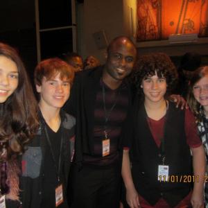 Bryce Hitchcock and friends with Wayne Brady backstage at Artists for Peace Organizations Never Again Concert and Tribute to Stevie Wonder