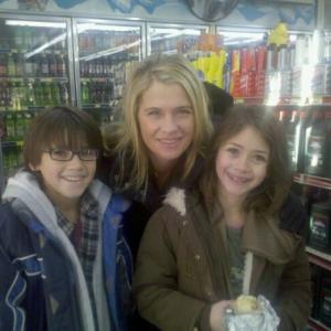 Kirstin on set of A Root Beer Christmas with brother Kevin and mom Kristy Swanson