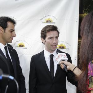 Russell Bailey and Alan Vidali on the red carpet for the premiere of BARMY at the Feel Good Film Festival.