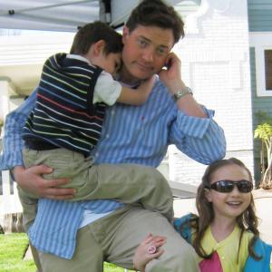 Meredith and Brendan Fraser hamming it up on the set of Extraordinary Measures