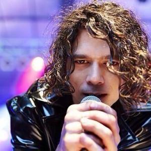 Still of Luke Arnold in Never Tear Us Apart The Untold Story of INXS 2014
