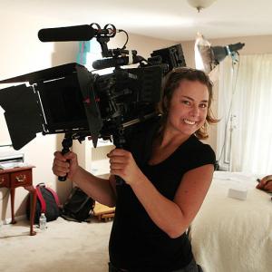 Natalie Cass holding Red Camera