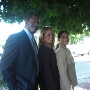 Veronica Loud right and Christina Boucher middle as Child Protection Services Officers on location for the FOX television series AMERICAS MOST WANTED