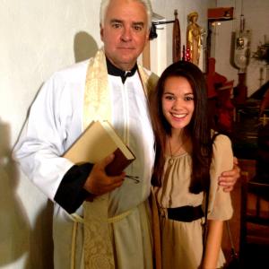 Christine Mascolo with John OHurley as Father David on the set of A Remarkable Life